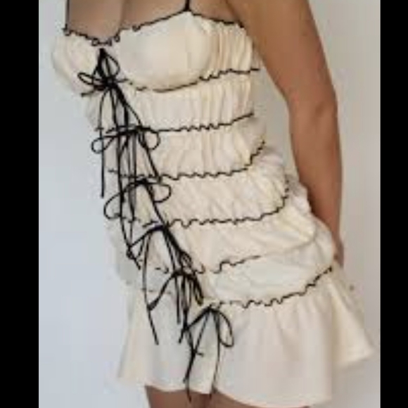 AKIRA Trendsetter Shell Ruffled Mini Dress with Black Accents - Picture 1 of 6